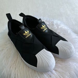NWOT adidas Superstar Slip-On
Core Black Cloud White Sneakers Size 8